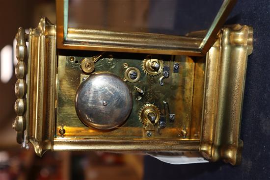 A French brass carriage clock by Ellis of Exeter and Paris, No. 905, lower platform escapement movement with push repeat and key height